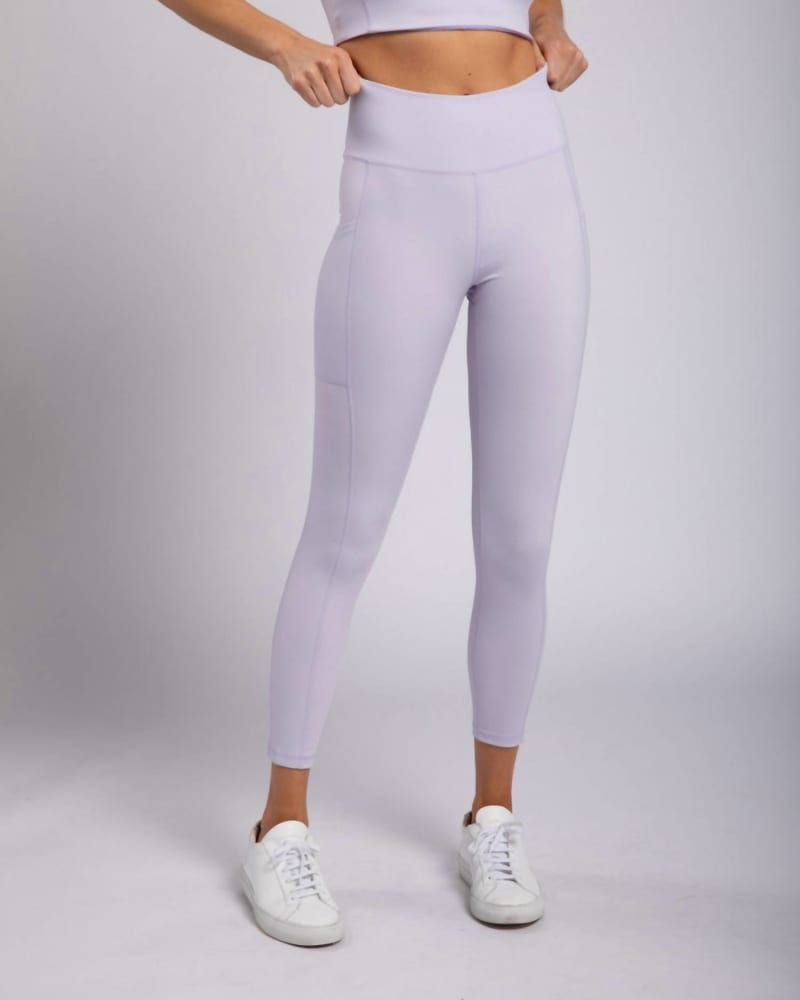 Front of a model wearing a size Large Essential Sweetheart Back High Waist Legging In Purple Heather in Purple Heather by mono b. | dia_product_style_image_id:353599